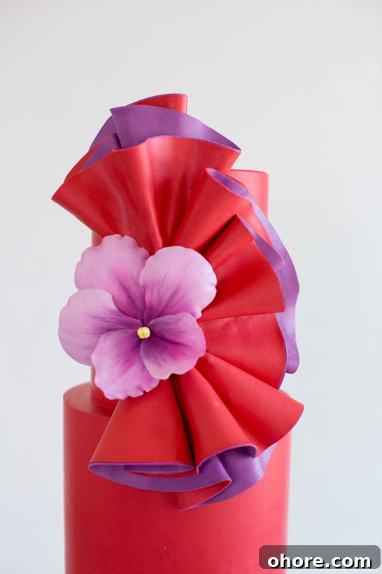 Dancing Violet Cake Recipe with Elegant Floral Frosting 3 Dancing Violets | Bold Wedding Cake Inspiration | by Intricate Icings on TheCakeBlog.com