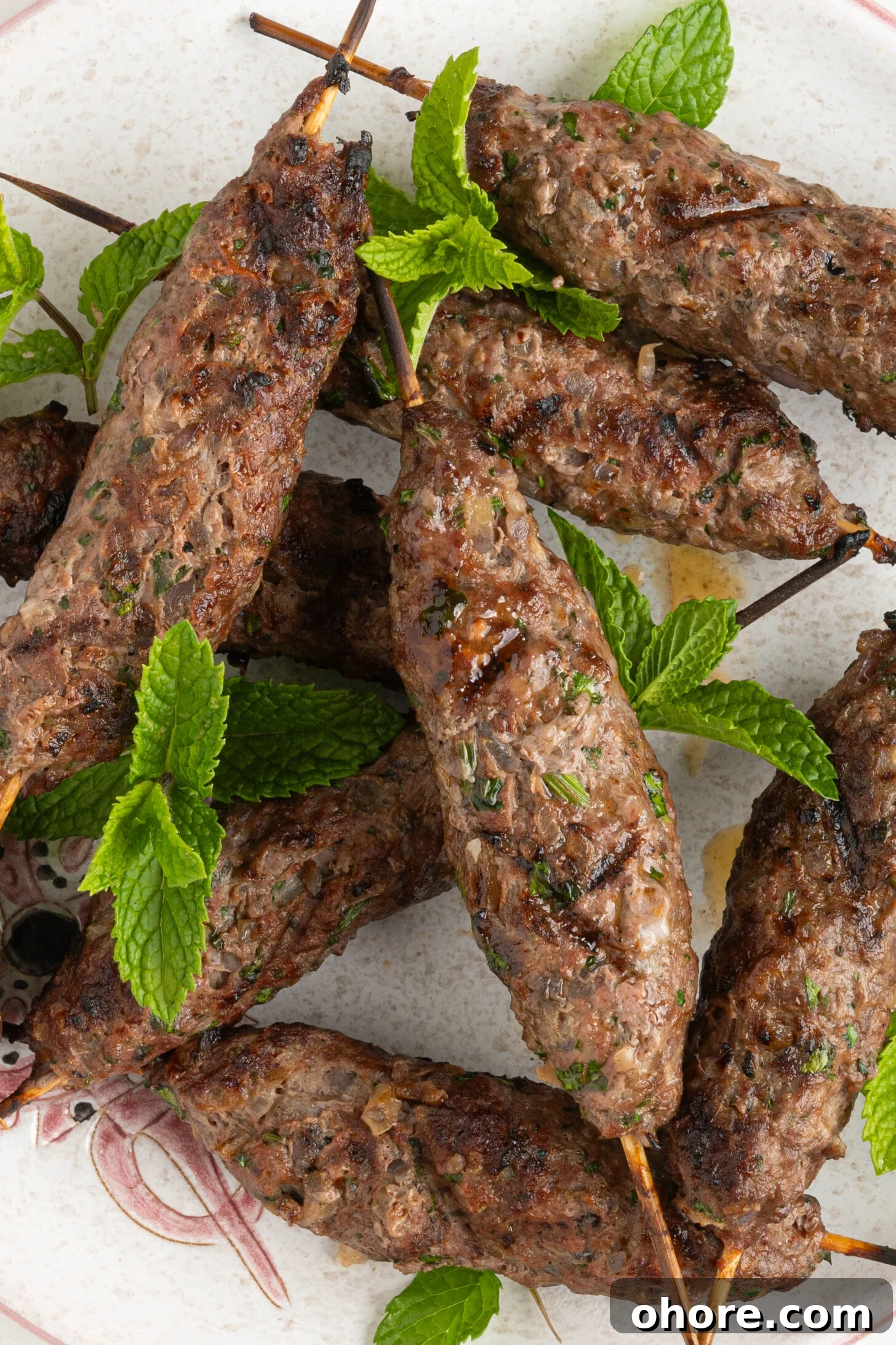 30-Minute Moroccan Kefta Brochettes Recipe — Grilled Lamb Skewers 12 a plate of Moroccan grilled kefta