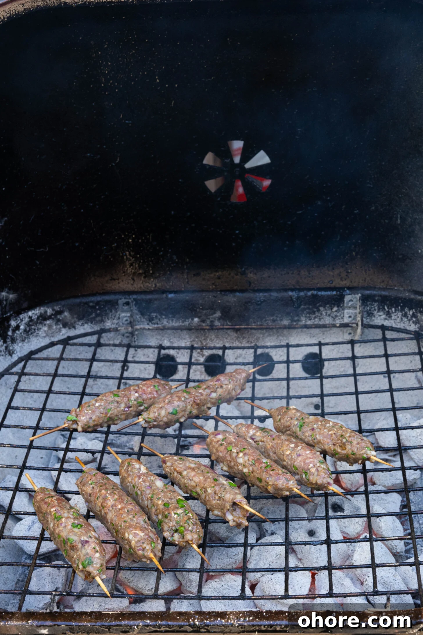30-Minute Moroccan Kefta Brochettes Recipe — Grilled Lamb Skewers 7 kefta on a grill