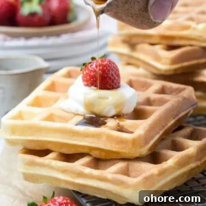 Sourdough Recipes for a Romantic Valentine’s Day Meal 7 Maple syrup drizzled over sourdough discard waffles topped with whipped cream and strawberries.