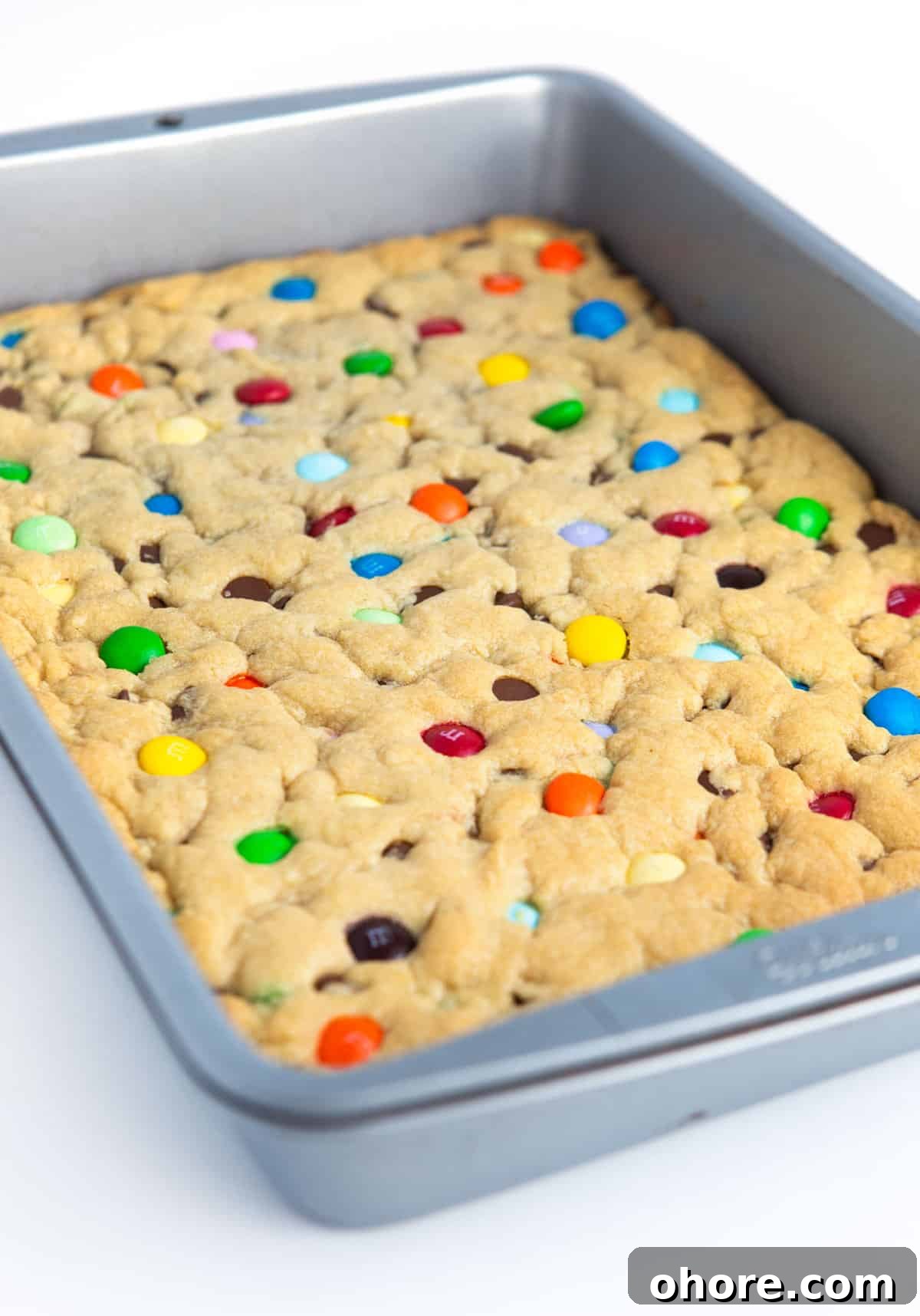 Chewy M&M Cookie Bars Recipe — Loaded Candy Cookie Bars 7 9x13 pan of Chewy M&M Cookie bars