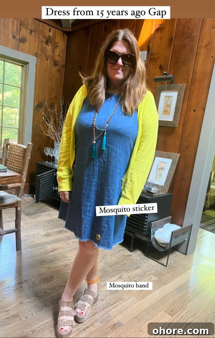 Mosquito Survival Guide: Teri’s Expert Tips for Avoiding Bites 6 woman in denim dress with yellow cardigan sandals and sunglasses in cabin