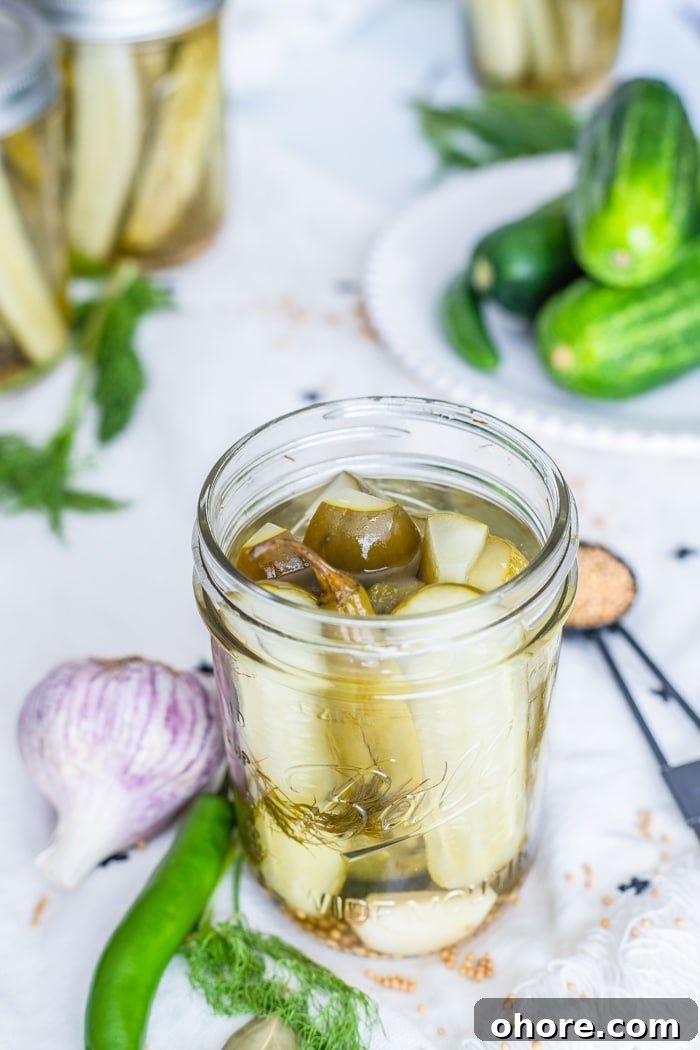 Dill Pickles Spears are easily made right in your own kitchen! dill pickle recipe for canning in a mason jar