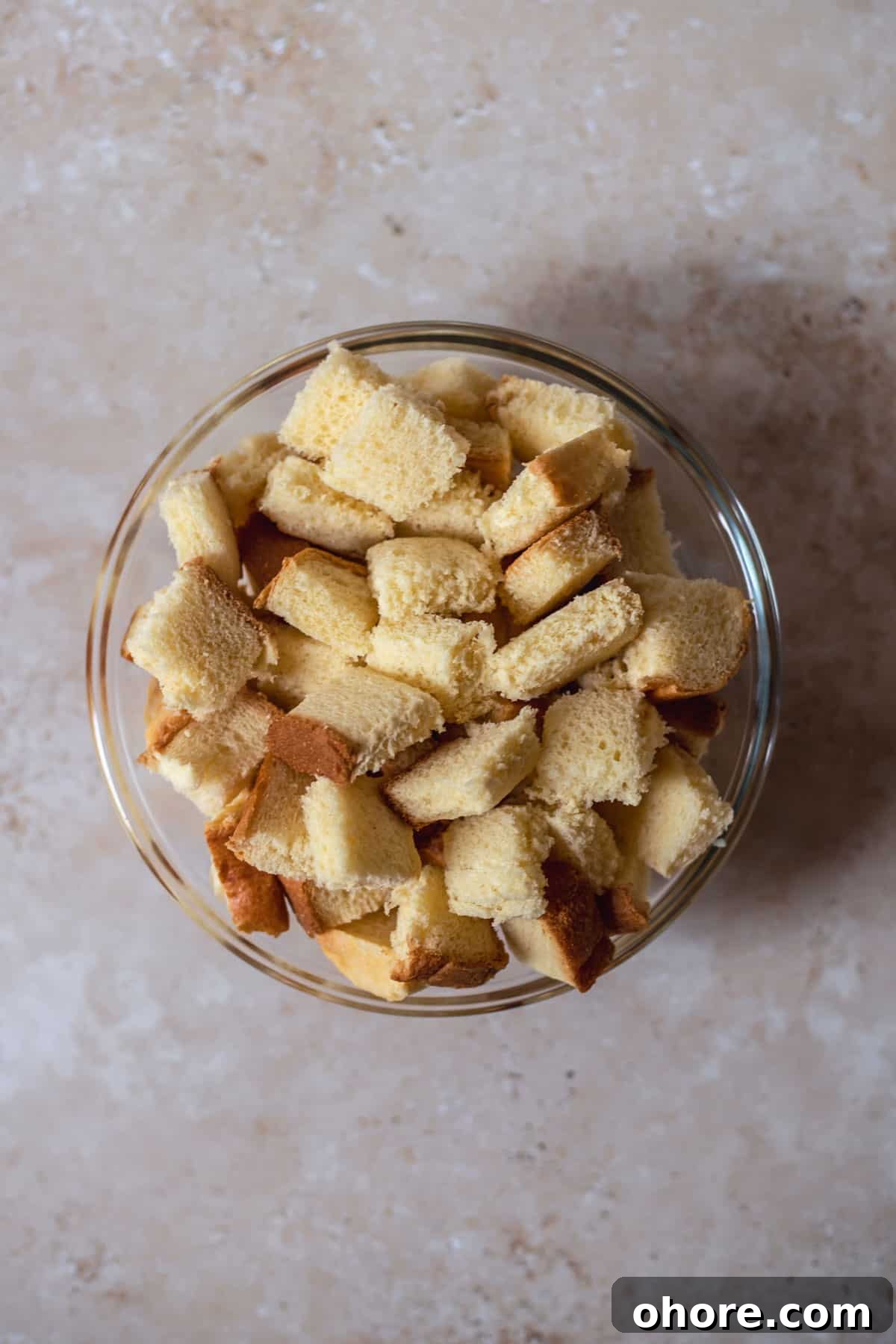 Berry Brioche Cream Cheese French Toast Bake for Brunch 4 pieces of bread in a glass bowl