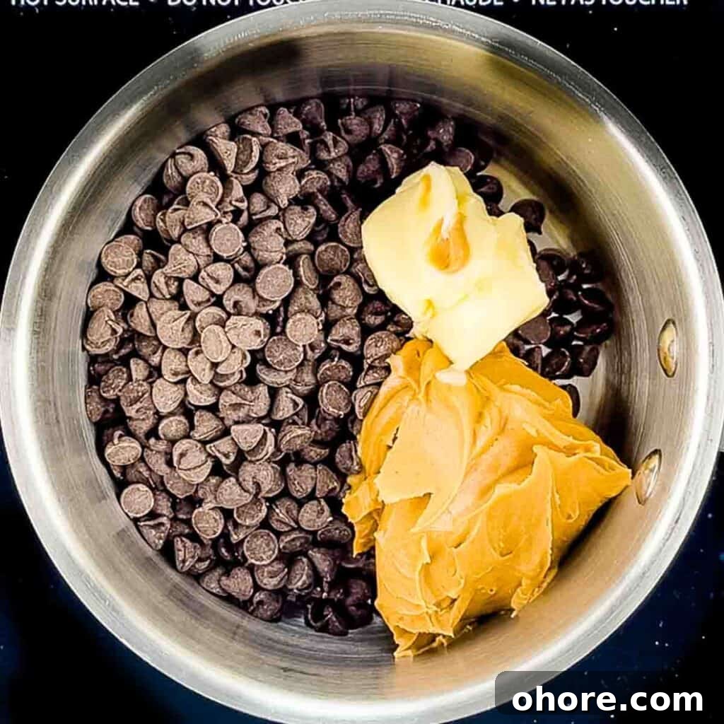 Valentine’s Puppy Chow: Festive Chocolate-Covered Snack Mix Recipe 5 Peanut butter, butter, and semi-sweet chocolate chips added to a saucepan.
