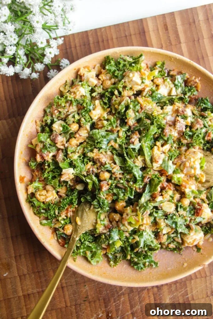 Crispy Rice Chicken Caesar Salad Recipe 10 Chicken Caesar rice salad mixed in a bowl.