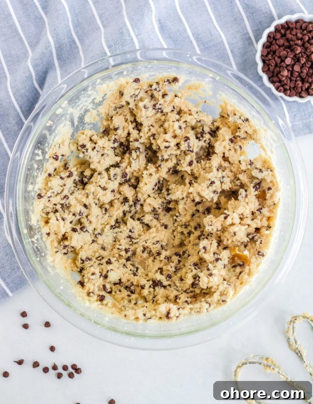 Keto Cookie Dough Fat Bombs Recipe for Low-Carb Snacking 4 cookie dough in a bowl ready to made into balls