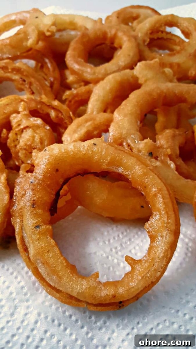 Old Fashioned Onion Rings on paper towel.