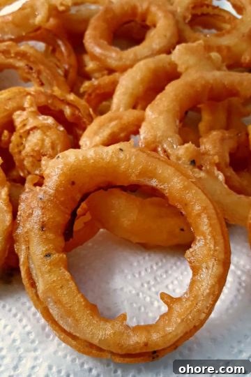 Old Fashioned Onion Rings on paper towel.
