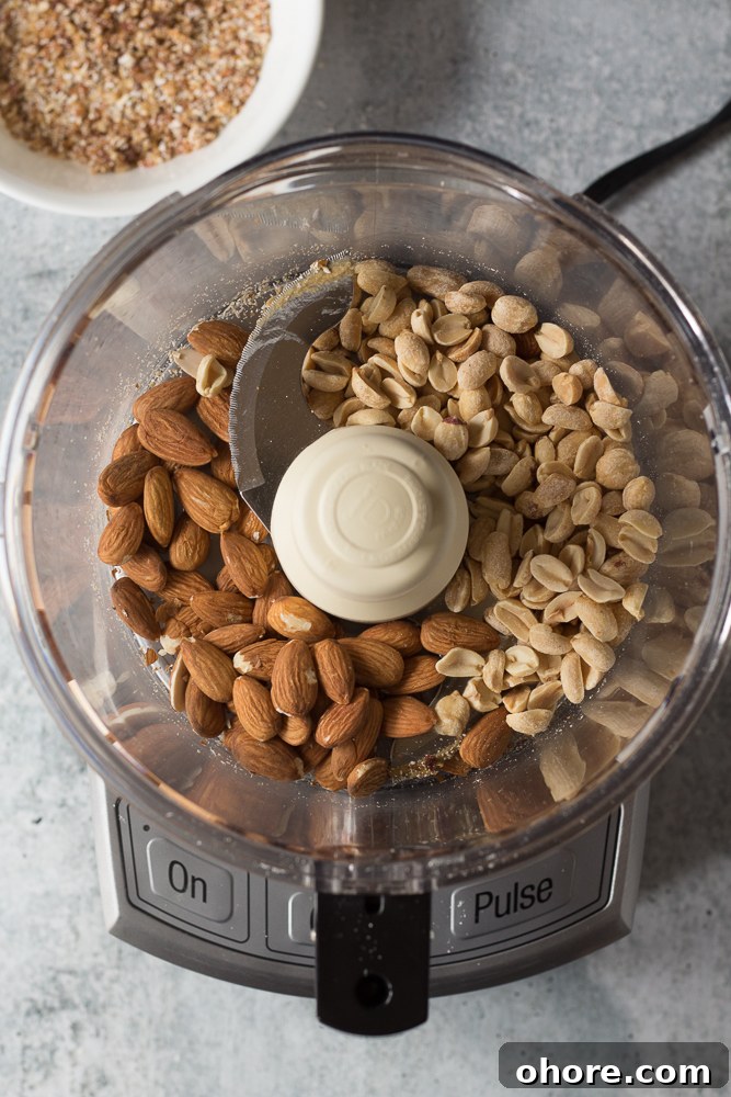 Vegan Peanut Butter Chocolate Truffles: No-Bake Snack Recipe 3 almonds and peanuts in blender by Flora & Vino