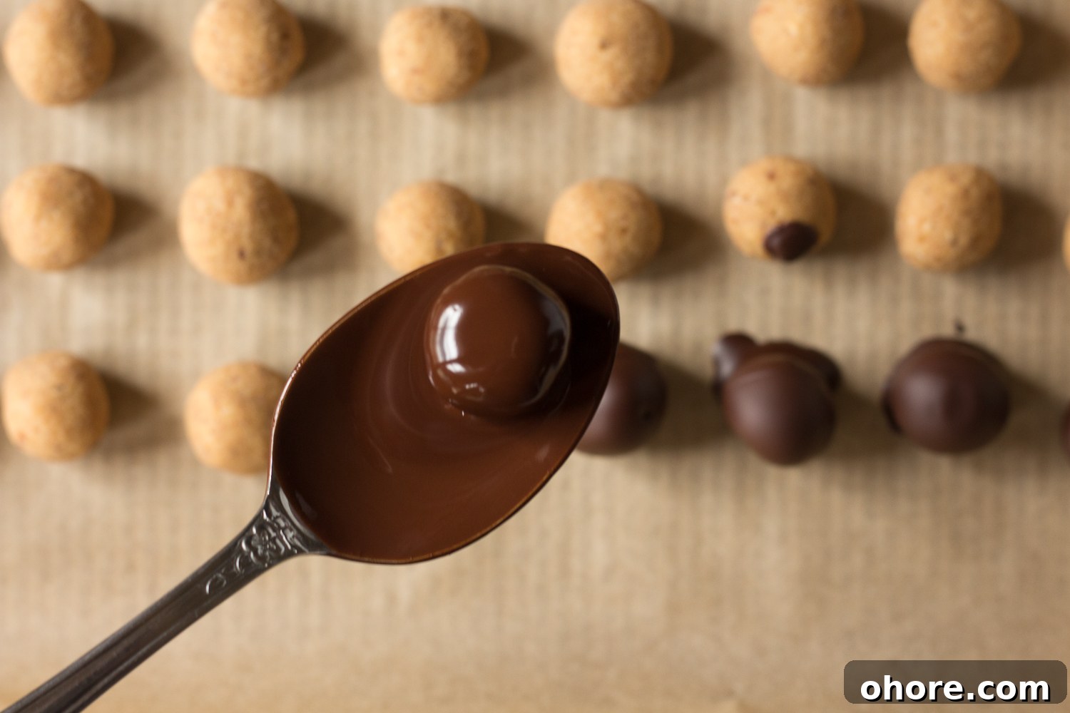 Vegan Peanut Butter Chocolate Truffles: No-Bake Snack Recipe 6 Vegan Peanut Butter balls dipped in melted dark chocolate by Flora & Vino