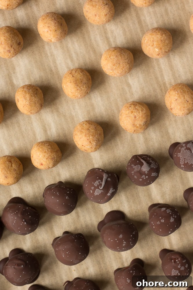 Vegan Peanut Butter Chocolate Truffles: No-Bake Snack Recipe 7 Vegan Peanut Butter Chocolate Balls on parchment paper by Flora & Vino
