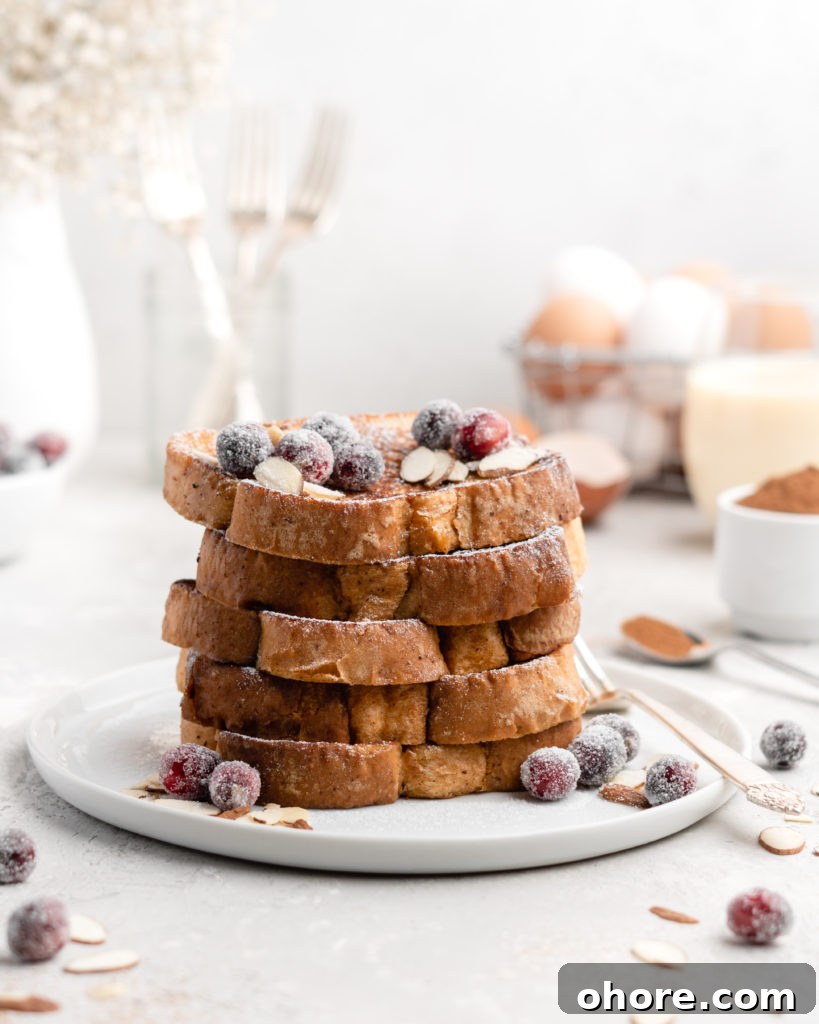 Eggnog French Toast with Buttered Maple Bourbon Syrup 3 This delicious Christmas-themed French Toast is soaked in an eggnog custard and topped with a buttered maple bourbon syrup