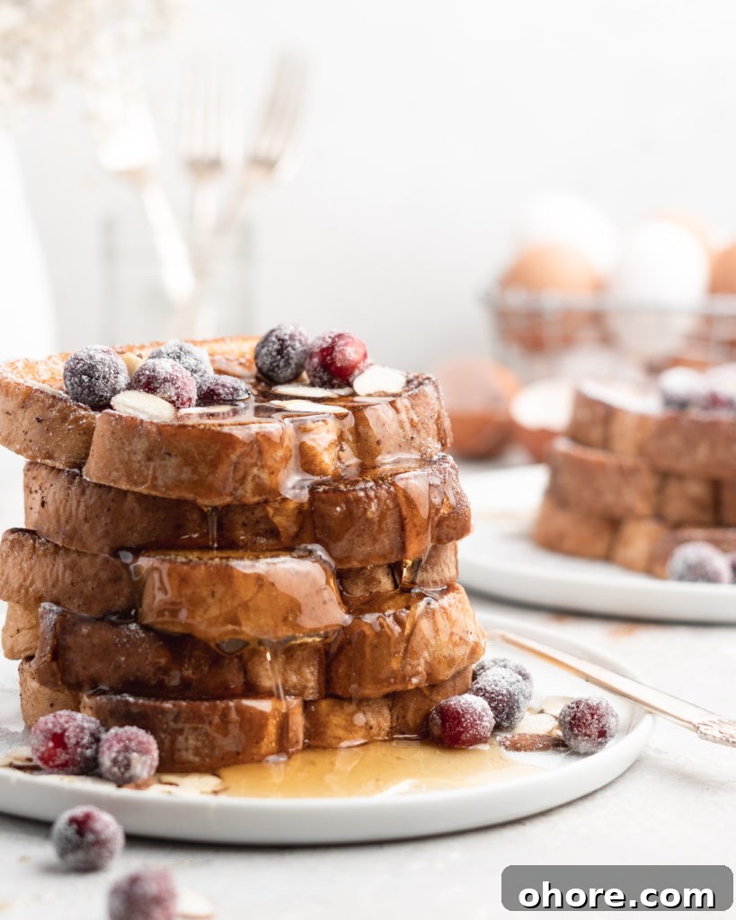 Eggnog French Toast with Buttered Maple Bourbon Syrup 4 This delicious Christmas-themed French Toast is soaked in an eggnog custard and topped with a buttered maple bourbon syrup