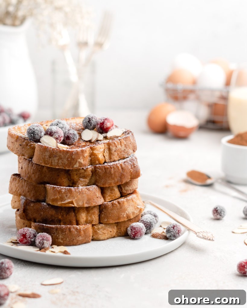 Eggnog French Toast with Buttered Maple Bourbon Syrup 5 This delicious Christmas-themed French Toast is soaked in an eggnog custard and topped with a buttered maple bourbon syrup