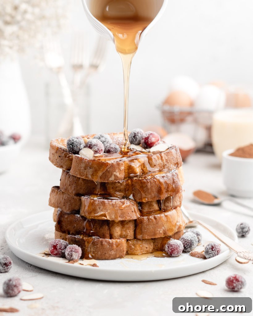 Eggnog French Toast with Buttered Maple Bourbon Syrup 6 This delicious Christmas-themed French Toast is soaked in an eggnog custard and topped with a buttered maple bourbon syrup