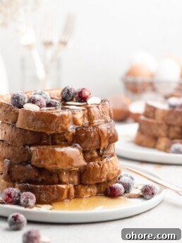 Eggnog French Toast with Buttered Maple Bourbon Syrup 7 This delicious Christmas-themed French Toast is soaked in an eggnog custard and topped with a buttered maple bourbon syrup