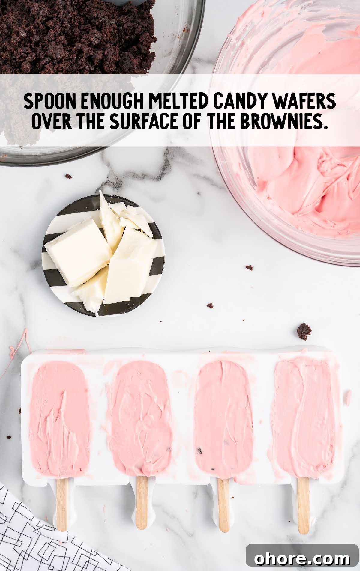 Cakesicle Recipes: How to Make Frozen Cake Pops at Home 10 melted candy wafers spooned over the surface of brownies