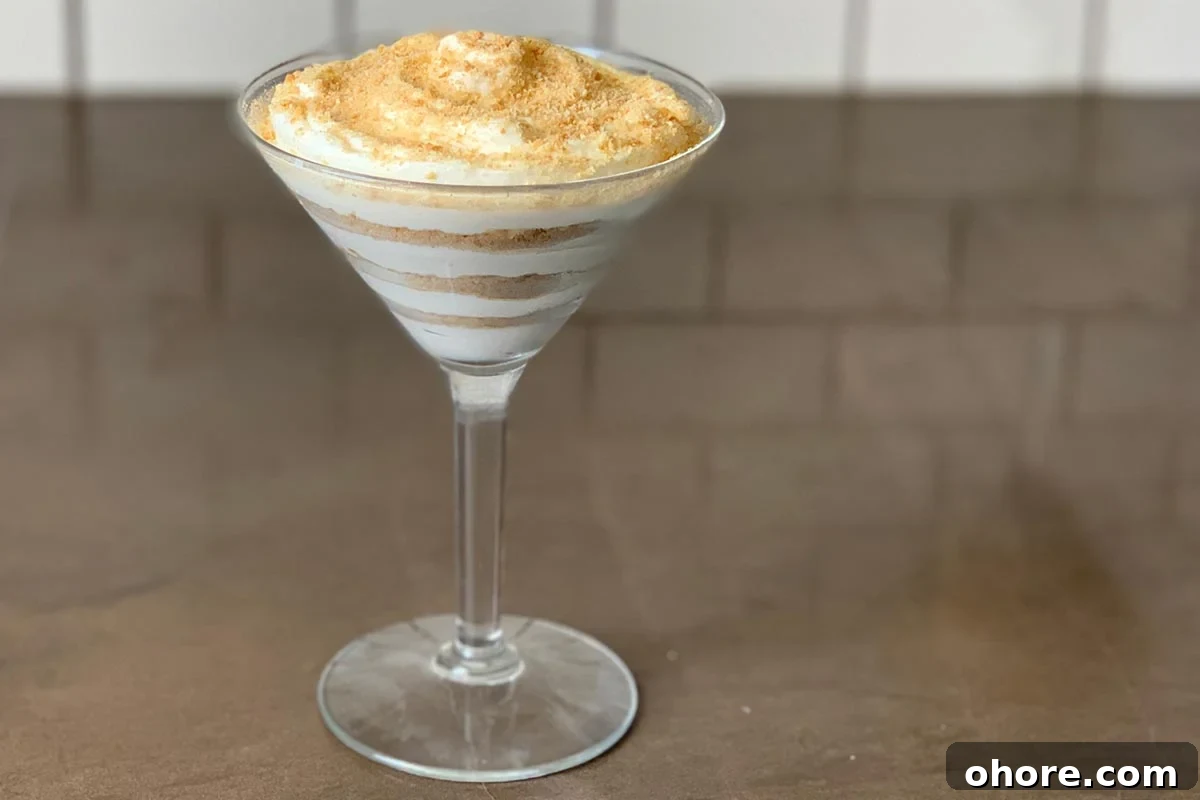 Serradura (Portuguese Sawdust Pudding): Authentic Recipe Guide 4 A serving of Portuguese sawdust pudding layered in a martini glass.