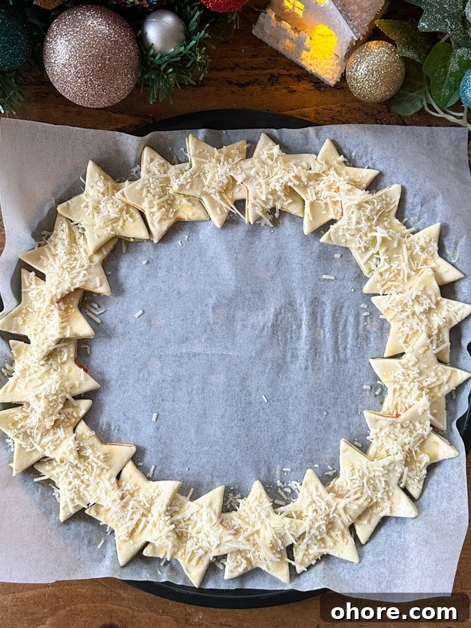 Pesto Puff Pastry Star Wreath Recipe for Holiday Appetizers 9 Wreath all ready for the oven, and top with grated parmesan.
