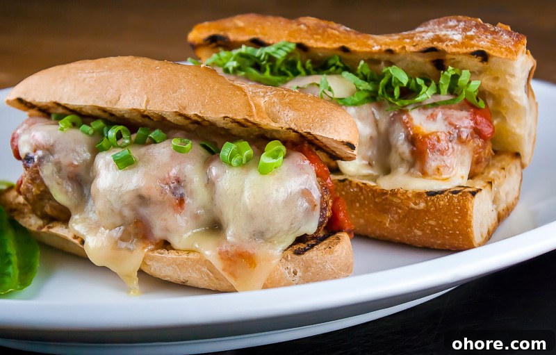 Gluten-Free Grilled Meatball Hoagies Recipe 5 Close up of the finished sandwiches; Grilled Meatball Hoagie Sandwiches with Spicy Tomato Sauce and Melted Cheese © 2018 Jane Bonacci, The Heritage Cook