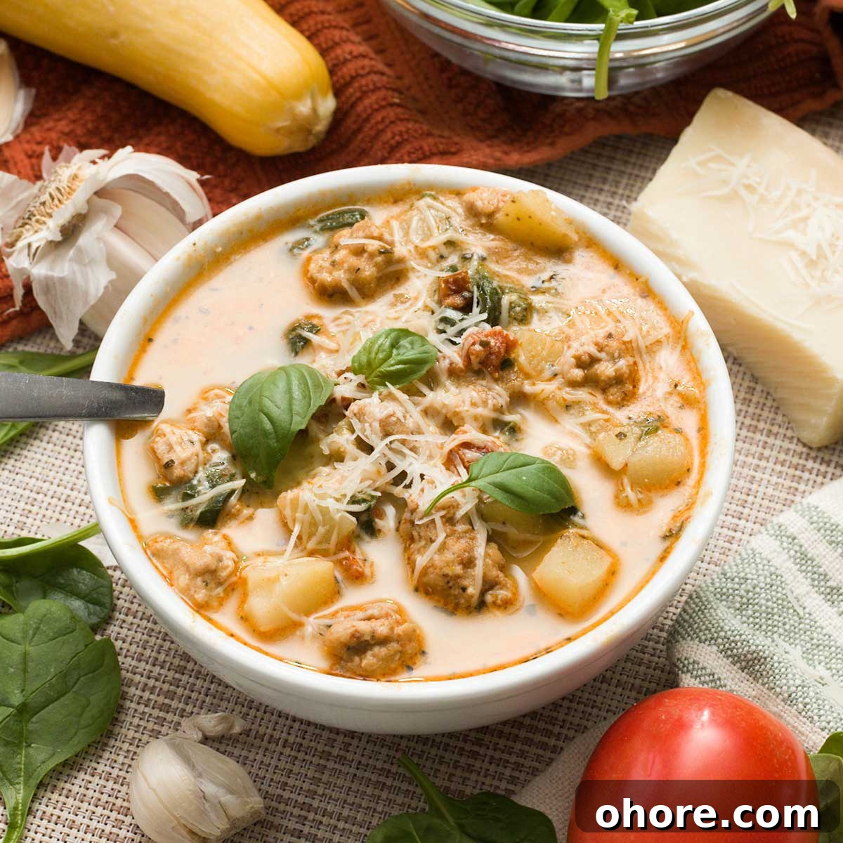 Stovetop Dutch Oven Shredded Chicken Recipe 11 A bowl of healthy marry me chicken soup with greek yogurt with spinach and sun-dried tomatoes.