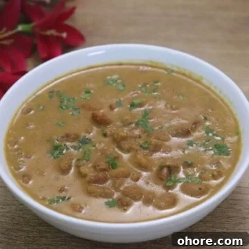 Goan alsande tonak served in a white bowl.