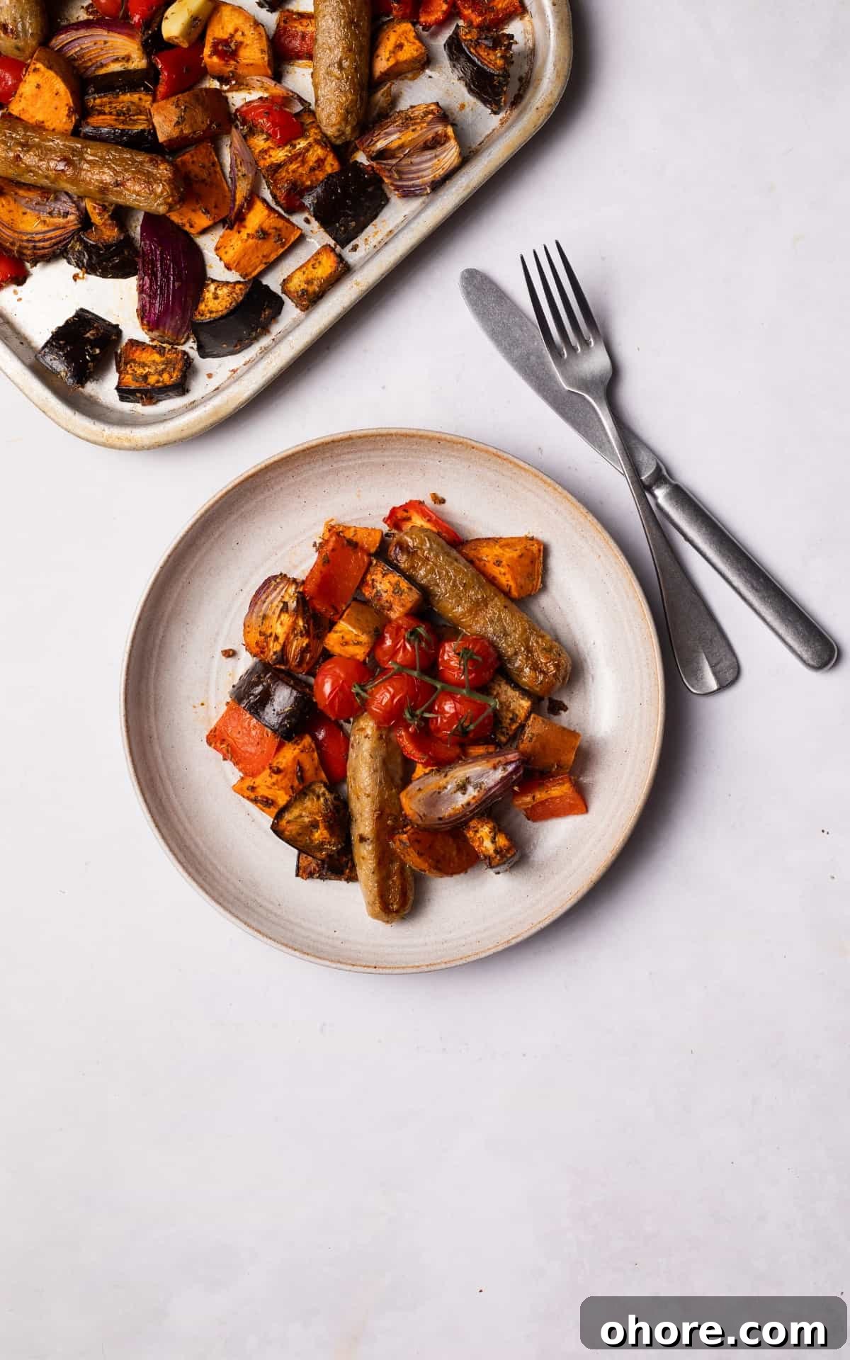 Sausage Tray bake served on a plate.