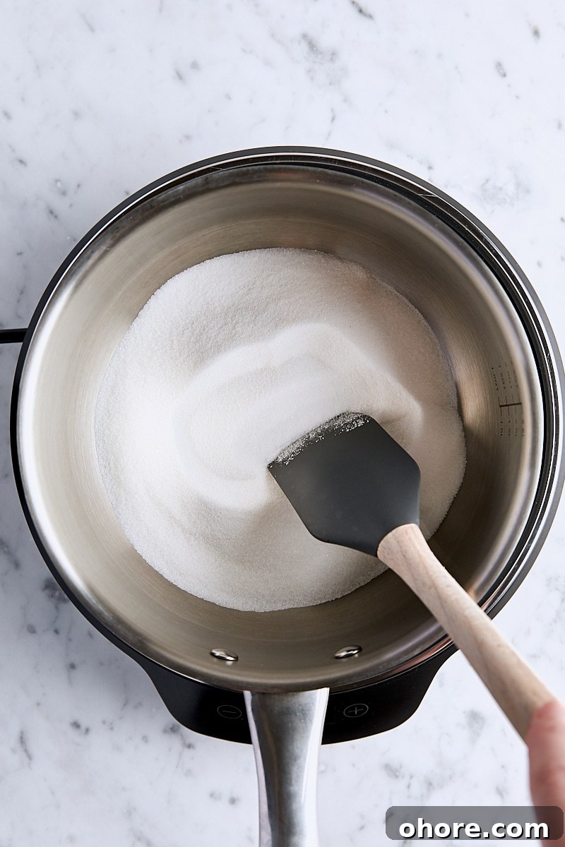 Granulated sugar in light-colored saucepan