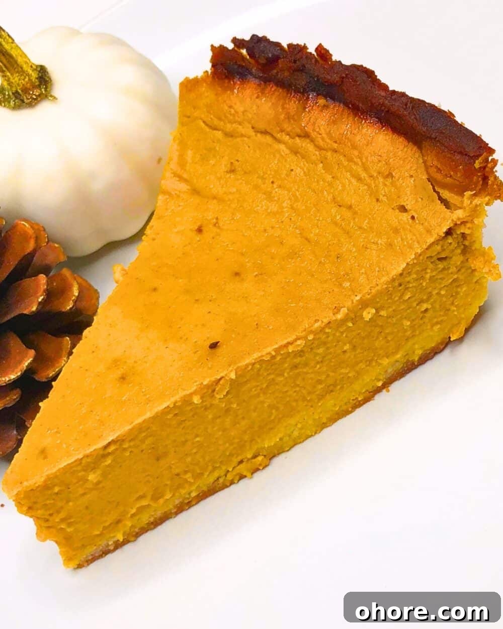 Keto Pumpkin Pie Recipe: Low-Carb, Creamy & Sugar-Free 3 keto pumpkin pie on plate with fall decor
