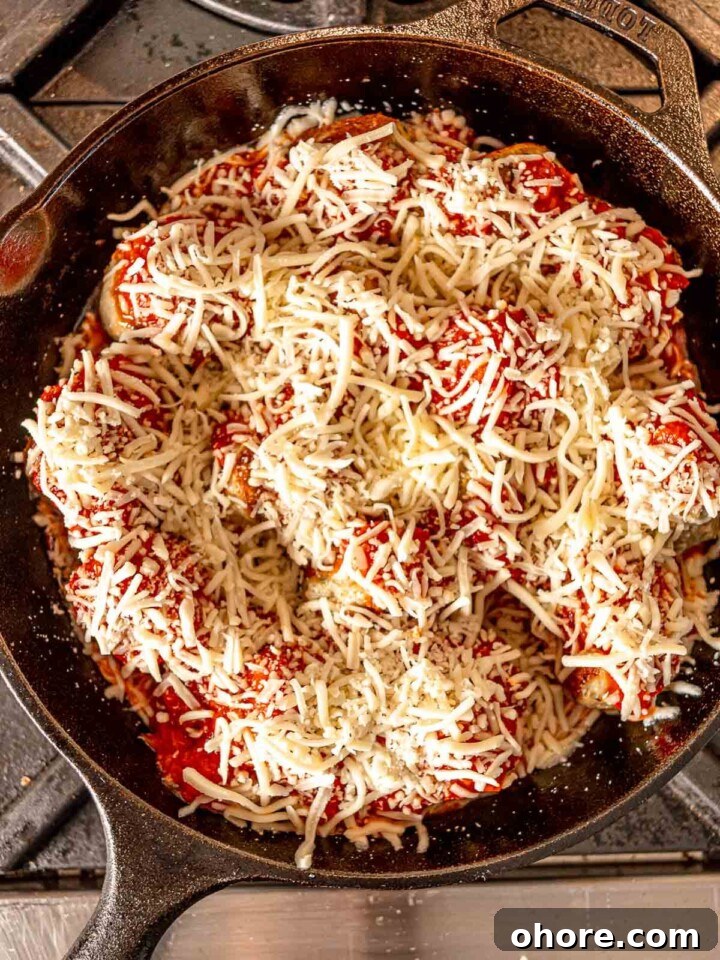 Baked Chicken Parmesan Meatballs Recipe That Melts in Your Mouth 6 Shredded mozzarella cheese on top of meatballs before baking.
