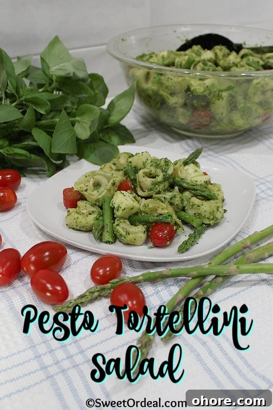 Fresh ingredients of asparagus, basil, and cherry tomatoes that go into this salad.