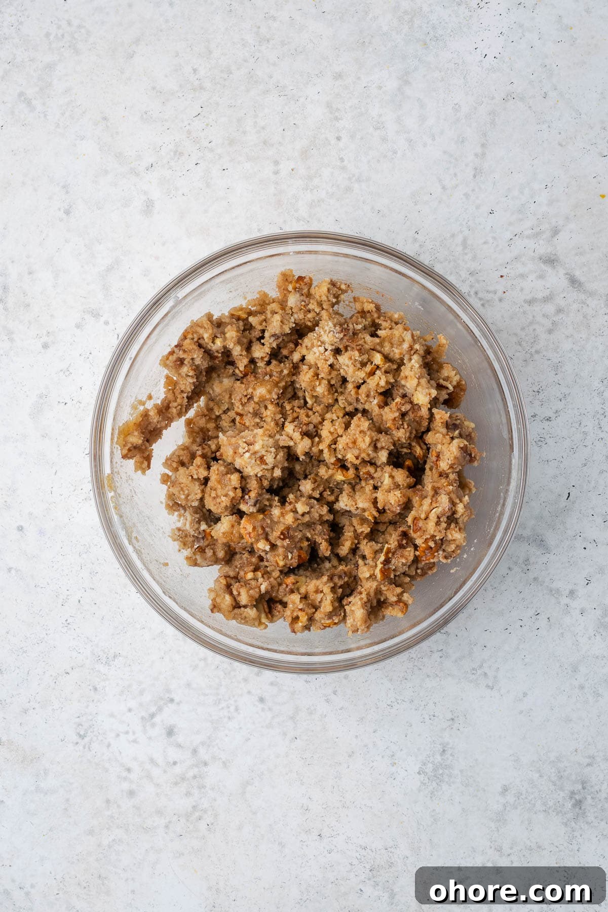 Apple & Blackberry Crumble Recipe: Rustic Autumn Dessert 4 Flour, brown sugar, pecans, cinnamon, salt and melted butter combined in a medium bowl to create the crumble topping.