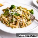 Broccoli Pasta Kids Will Actually Love: Creamy Weeknight Recipe 15 Broccoli pasta on plates with fork and napkin in the background