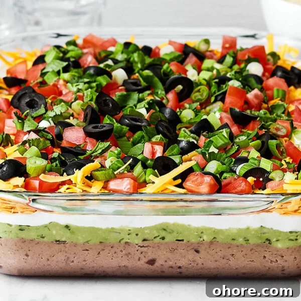 7 layer dip next to cilantro
