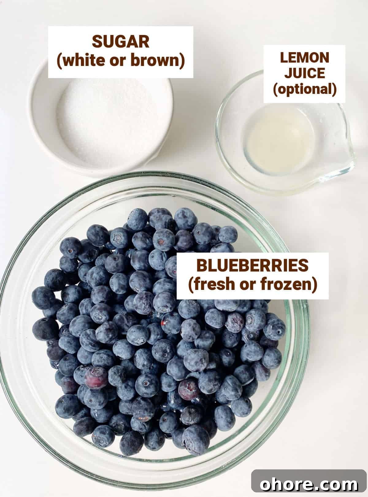 Blueberry Compote Recipe: Simple Homemade Blueberry Sauce 4 Bowls containing ingredients for blueberry compote including sugar and lemon juice on white surface.