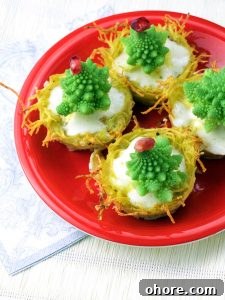 Mini Christmas Tree Quiches: Festive Savory Holiday Appetizers 3 Christmas Tree Mini Quiches in a Red Plate on the White Table