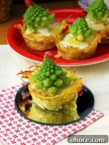 Mini Christmas Tree Quiches: Festive Savory Holiday Appetizers 7 Christmas Tree Mini Quiches on the Table with Festive Napkins