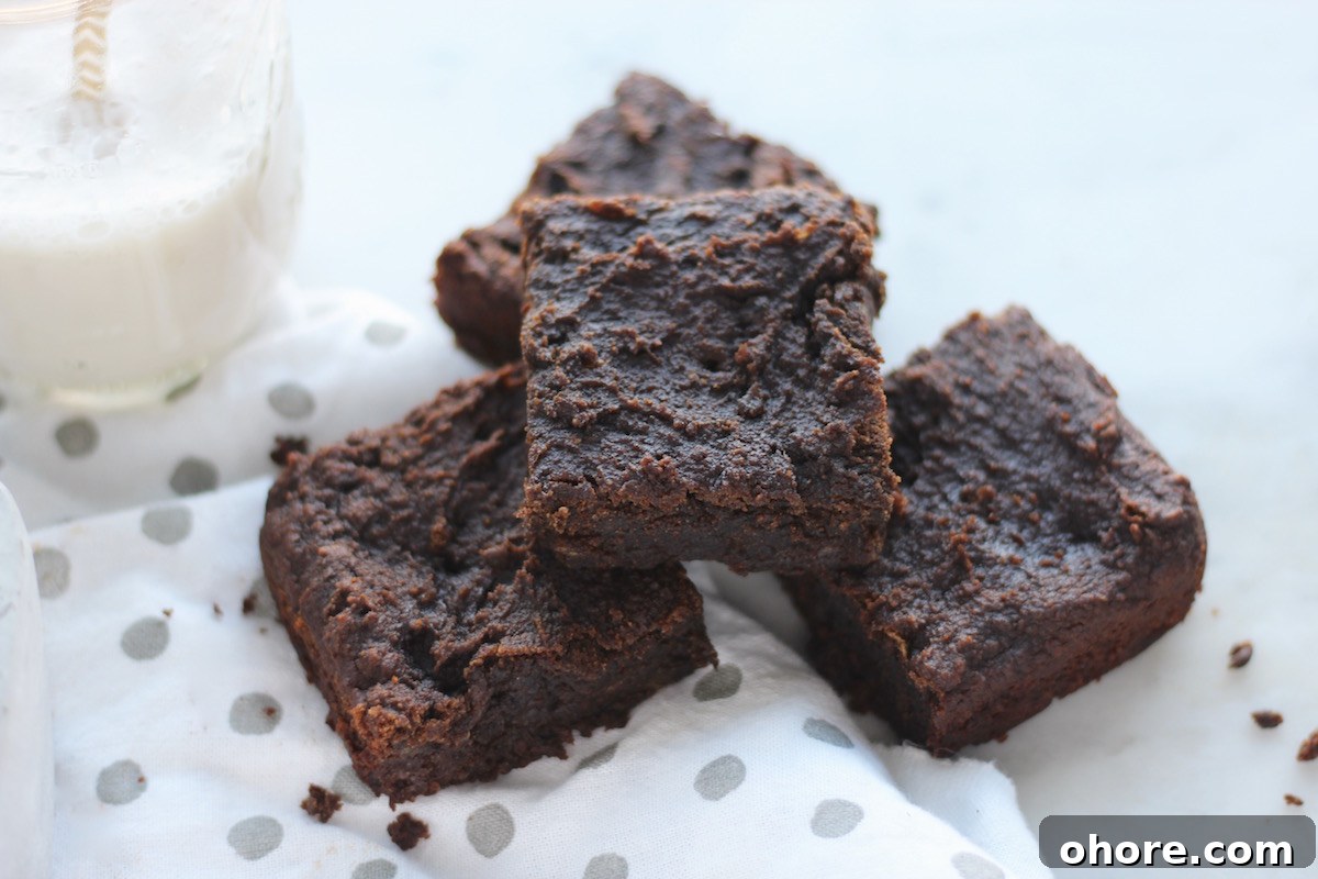 Carob Banana Brownies (AIP Paleo) — Grain-Free Dessert Recipe 8 AIP Carob Banana Brownies (Paleo) - thick and fudgy egg-free brownies made with ripe bananas, carob, and coconut butter! SO GOOD! | fedandfulfilled.com