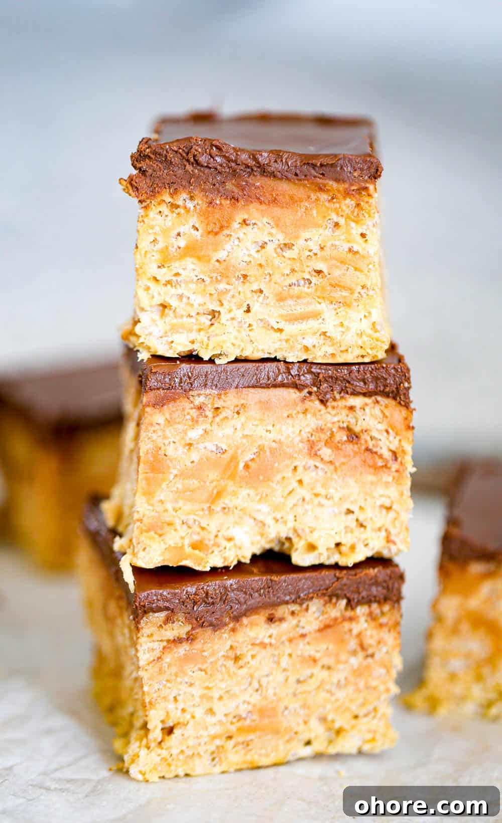 Chewy Caramel Peanut Butter Rice Krispie Treats 5 stack of snacks