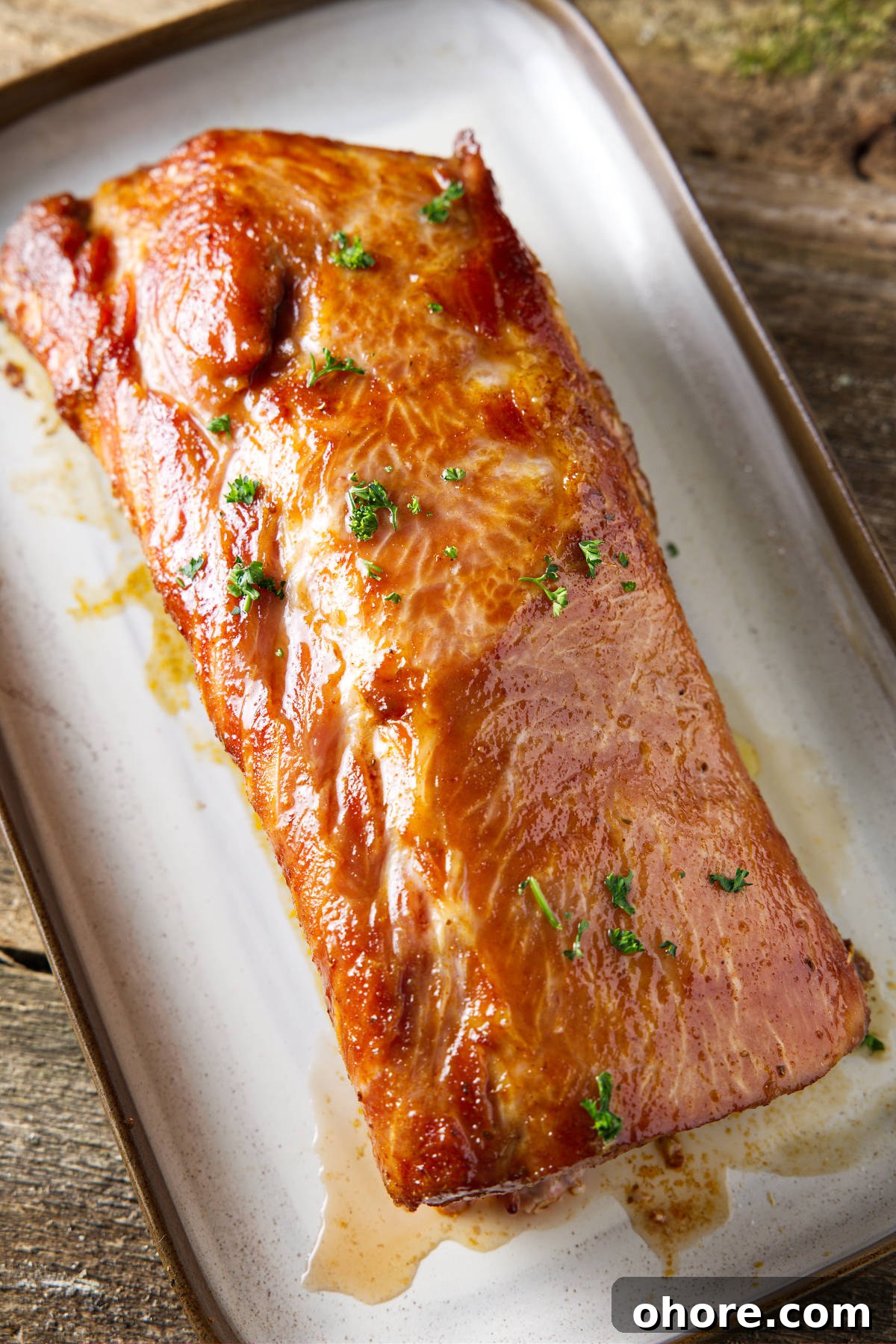 Juicy Smoked Pork Loin Recipe for Tender, Flavorful Results 13 whole smoked pork loin resting on plate