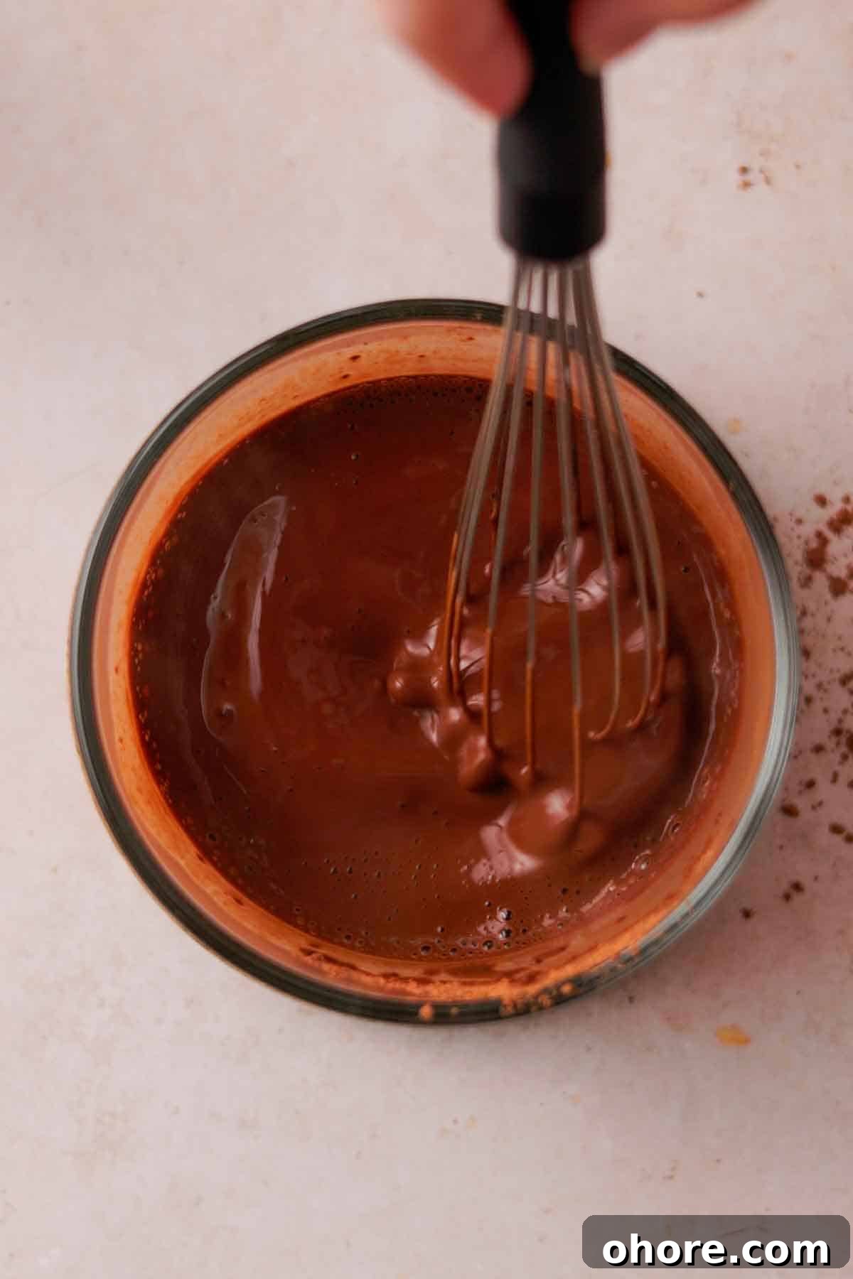 Ferrero Rocher Cupcakes Recipe: Decadent Hazelnut Chocolate Cupcakes 6 whisking cocoa powder and hot water to bloom