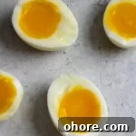 Perfect Jammy Eggs Recipe: Soft-Boiled Egg Guide 13 The perfect jammy egg on the counter.