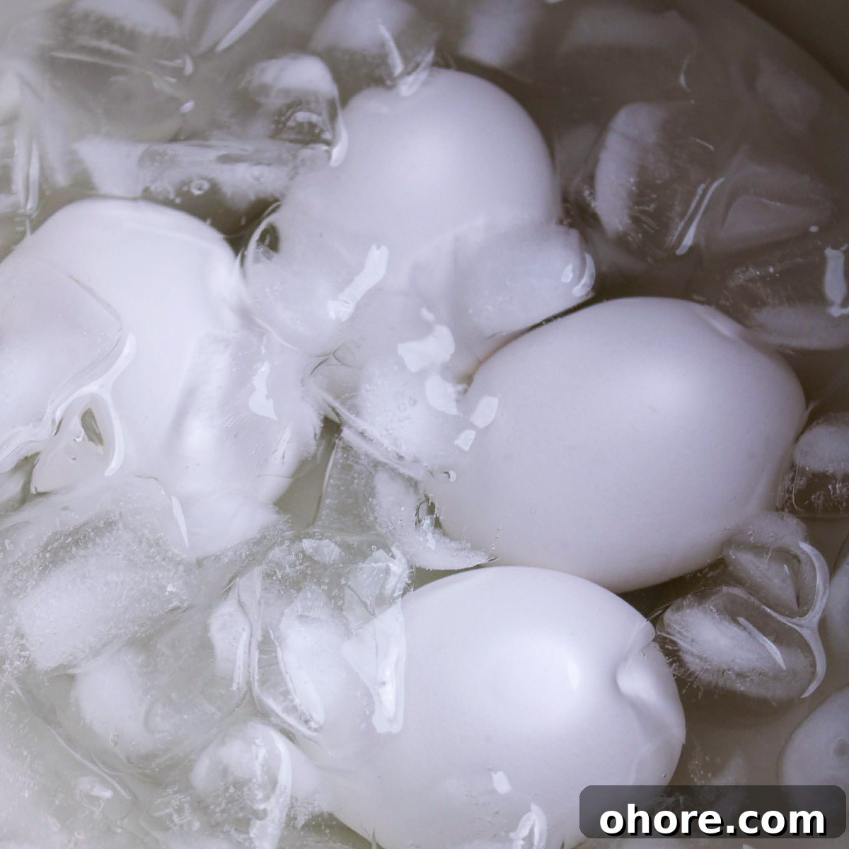 Perfect Jammy Eggs Recipe: Soft-Boiled Egg Guide 5 Eggs in the ice bath.