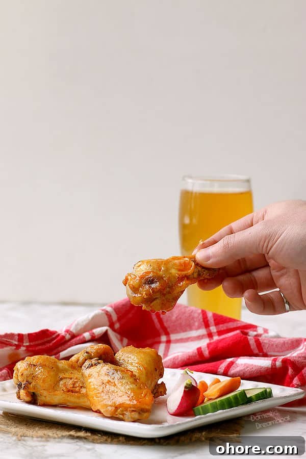 Crispy Oven-Baked Hot Wings for Game Night 4 Crispy Baked Hot Wings - Domestic Dreamboat #glutenfree #chickenwings #hotwings