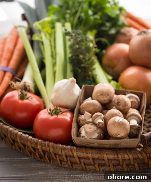 Low-Sodium Vegetable Broth Recipe for Flavorful Soups and Stews 4 Homemade Vegetable Broth| A FoodCentricLife.com