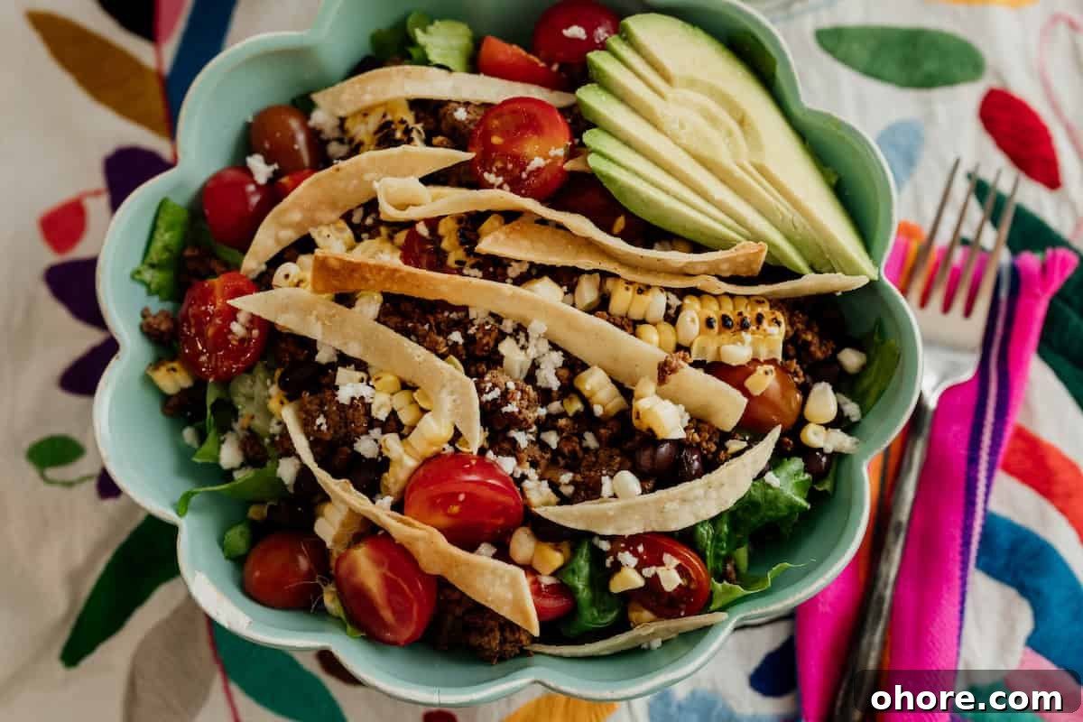 Crispy Taco Salad with zesty avocado lime dressing 5 Taco salad in a turquoise bowl