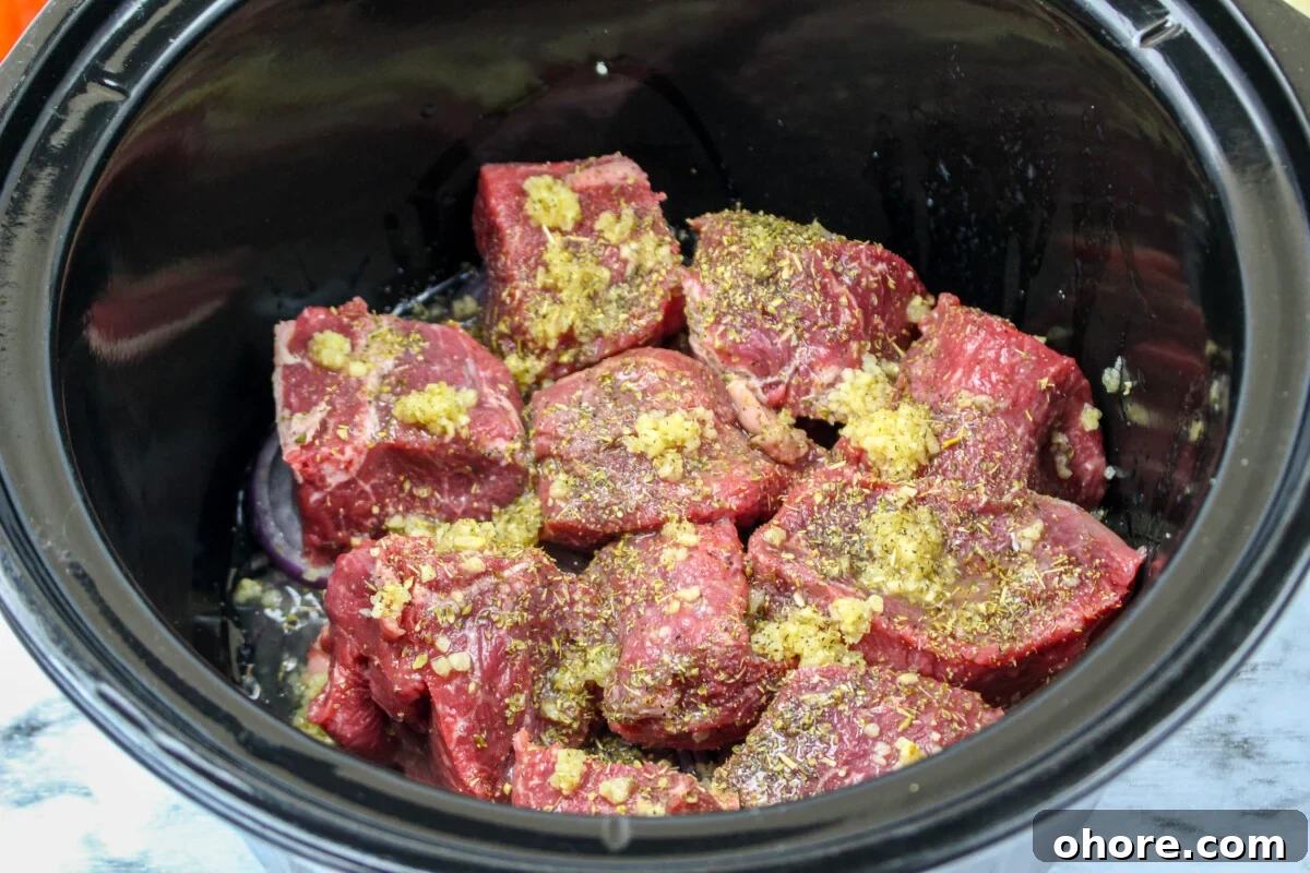 Slow Cooker Beef Gyros Recipe: Tender, Flavorful Greek Sandwiches 6 seasonings on top of the chuck roast.