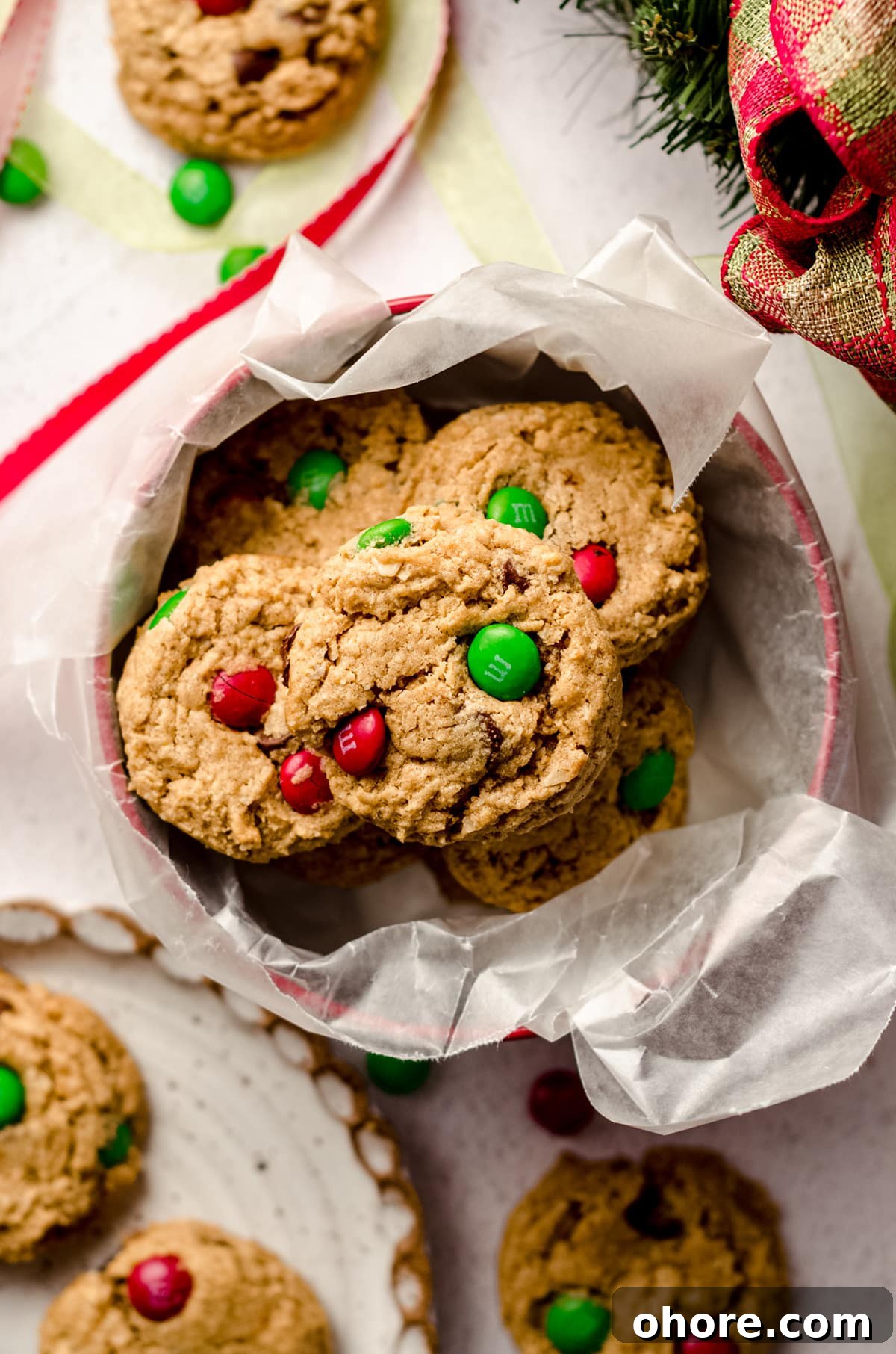 Ultimate Monster Cookie Recipe for Chewy, Loaded Cookies 12 christmas monster cookies in a cookie tin