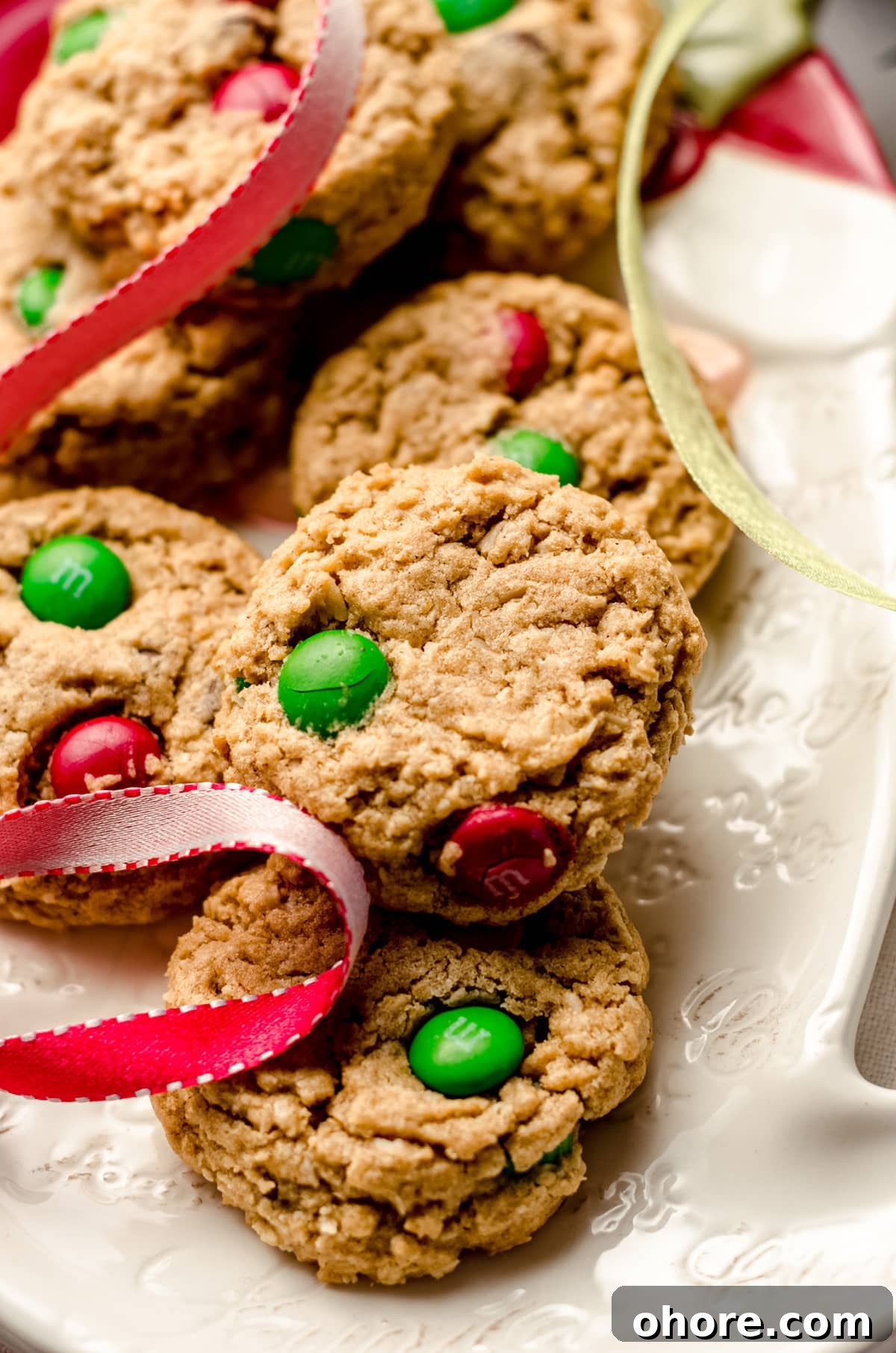 Ultimate Monster Cookie Recipe for Chewy, Loaded Cookies 5 christmas monster cookies on a santa plate